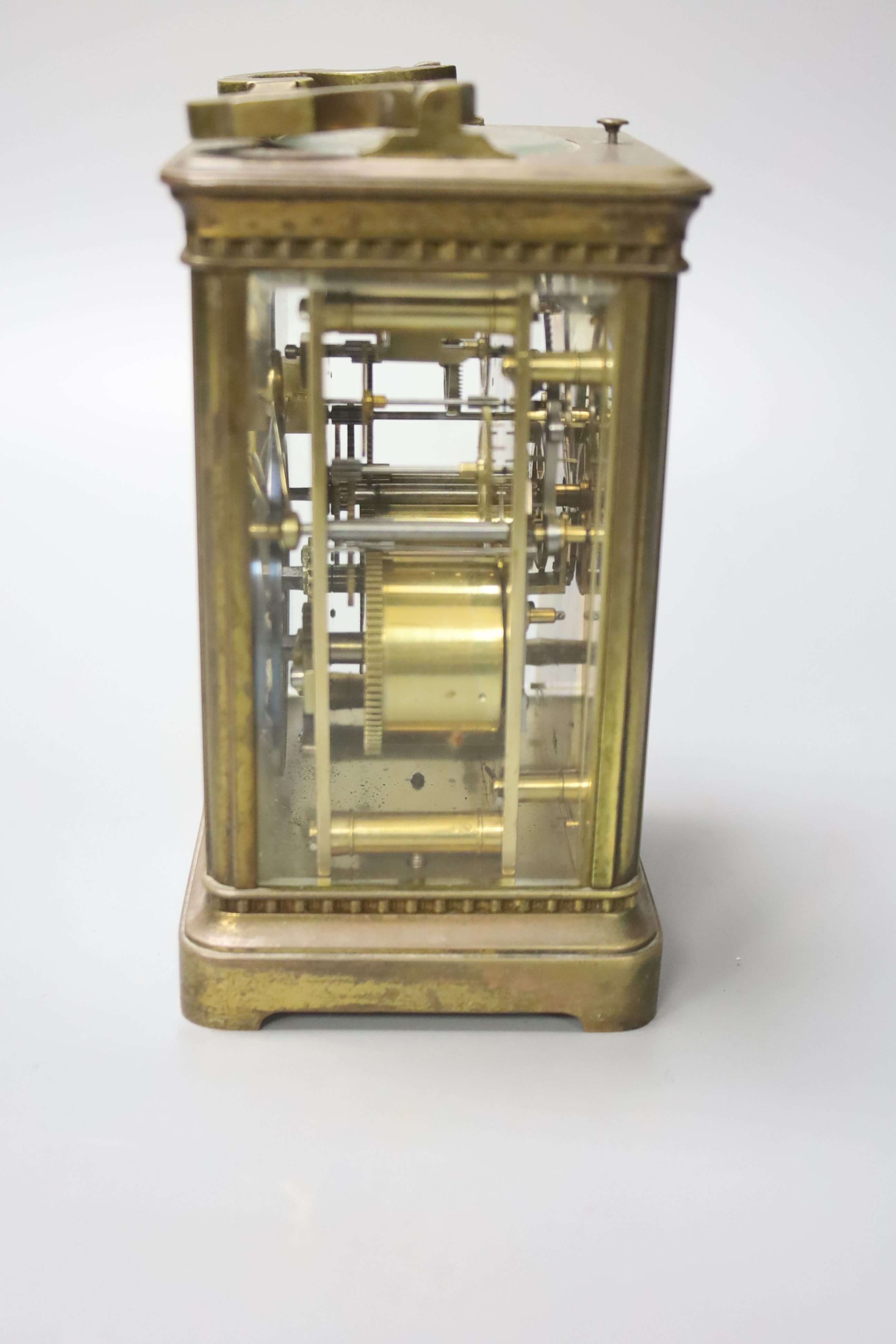 A French brass carriage clock with repeat, 18.5 cm high with the handle up